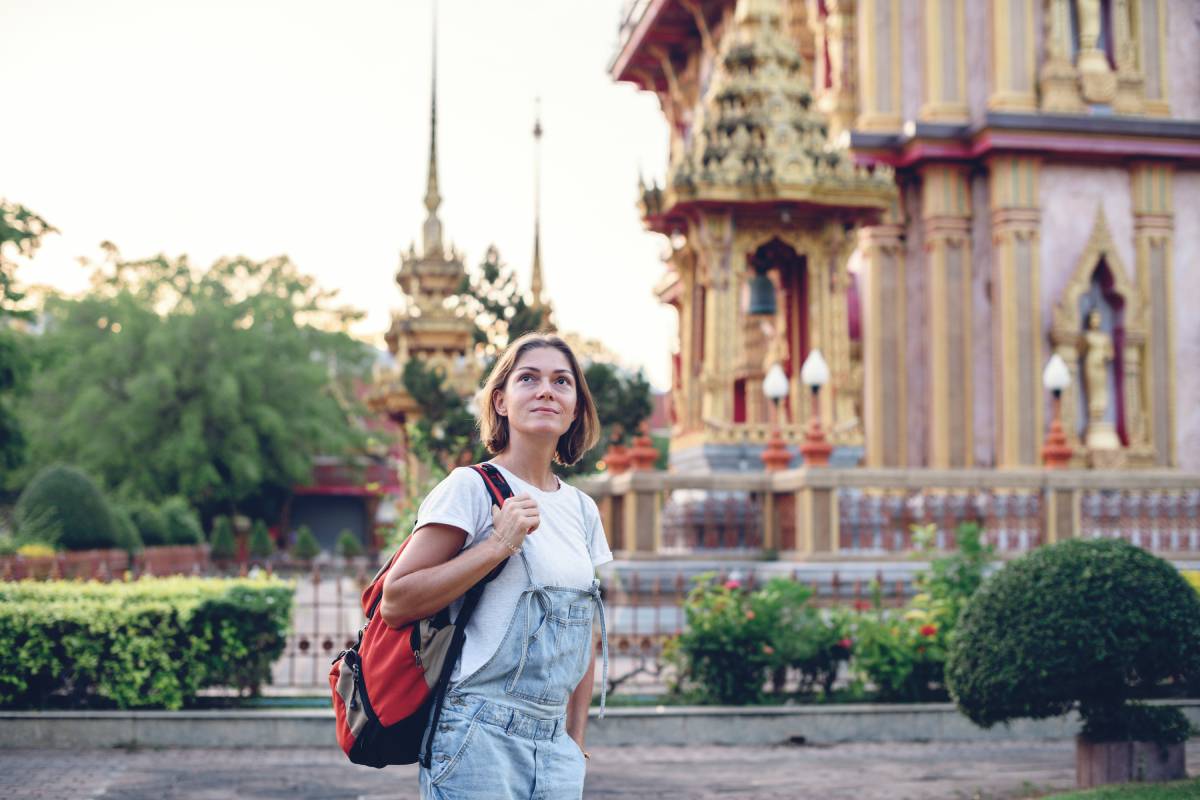 backpacker-seeing-sights-thai-temple-wat-chalong-2024-12-06-15-40-54-utc(article)