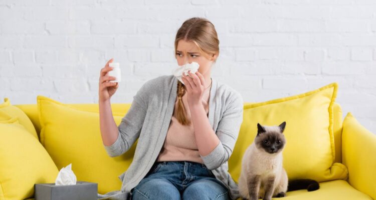 woman-with-napkin-looking-at-jar-with-pills-during-2024-11-10-16-53-33-utc (1)