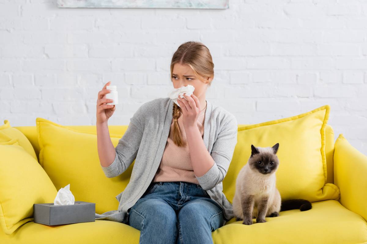 woman-with-napkin-looking-at-jar-with-pills-during-2024-11-10-16-53-33-utc (1)