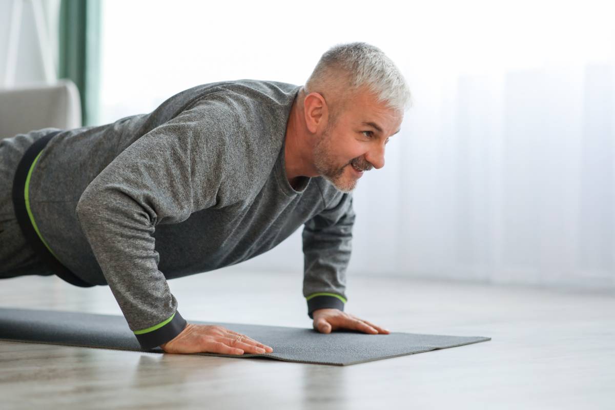 closeup-of-elder-man-exercising-at-home-2023-11-27-05-11-36-utc (1)