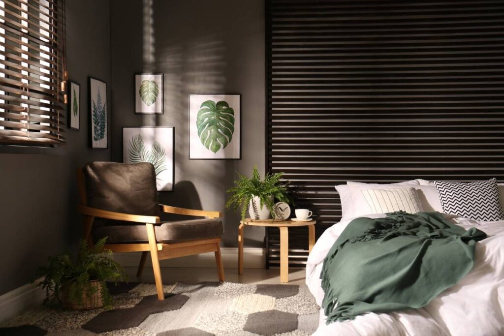 Bedroom plantation shutters controlling morning light in Australian home